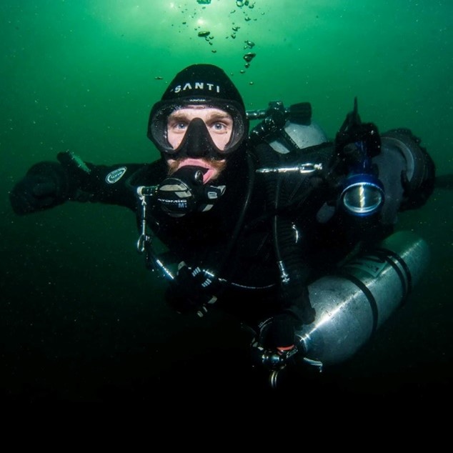 Daniel Geldof diving in scuba gear