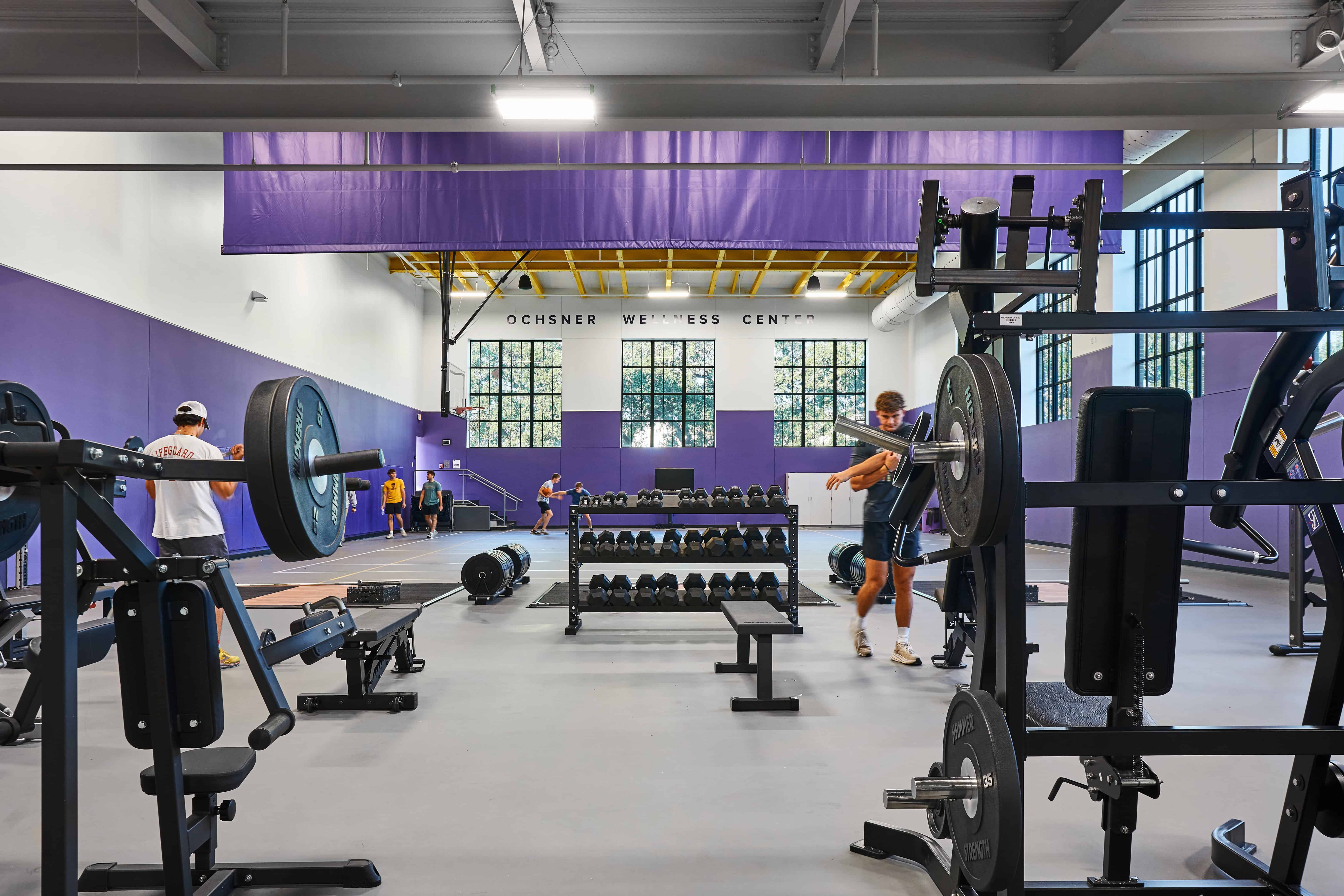 Wellness Center free weights in use by students